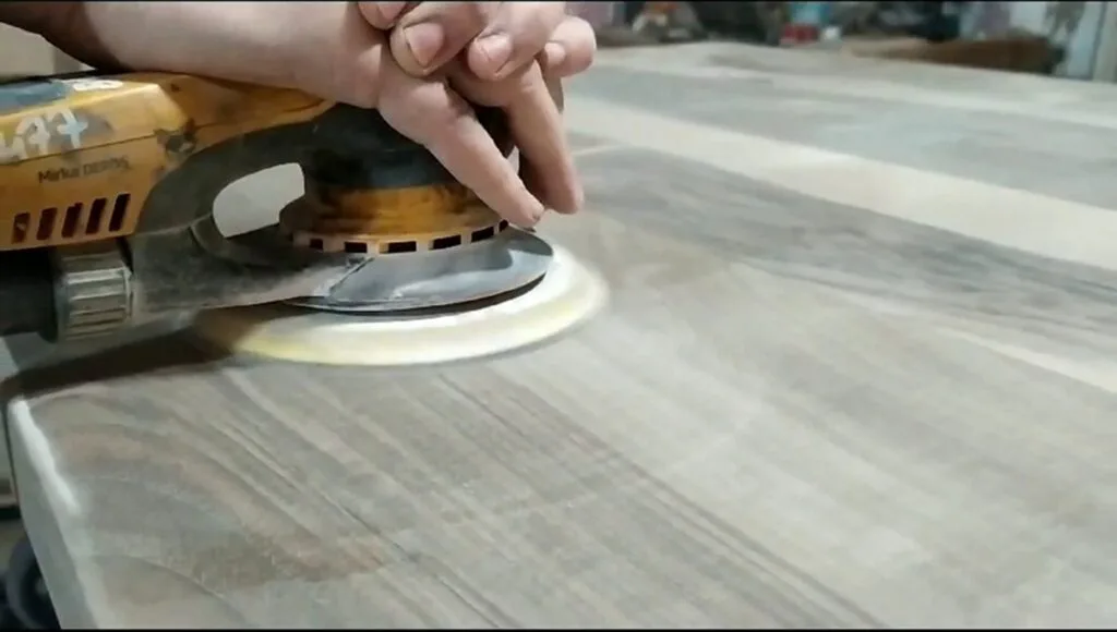 Woodworker crafting live edge walnut handmade dining table