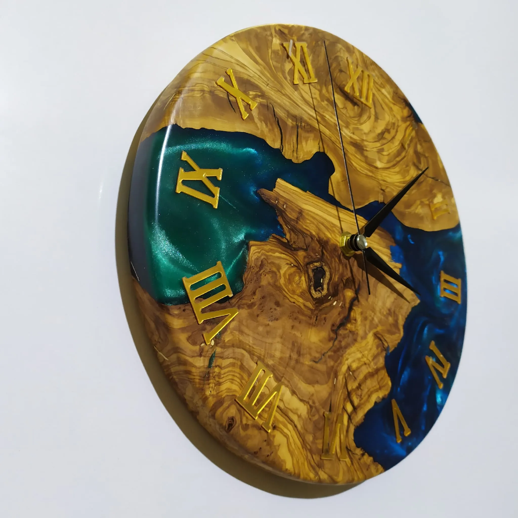 Olive wood epoxy wall clock grain close-up