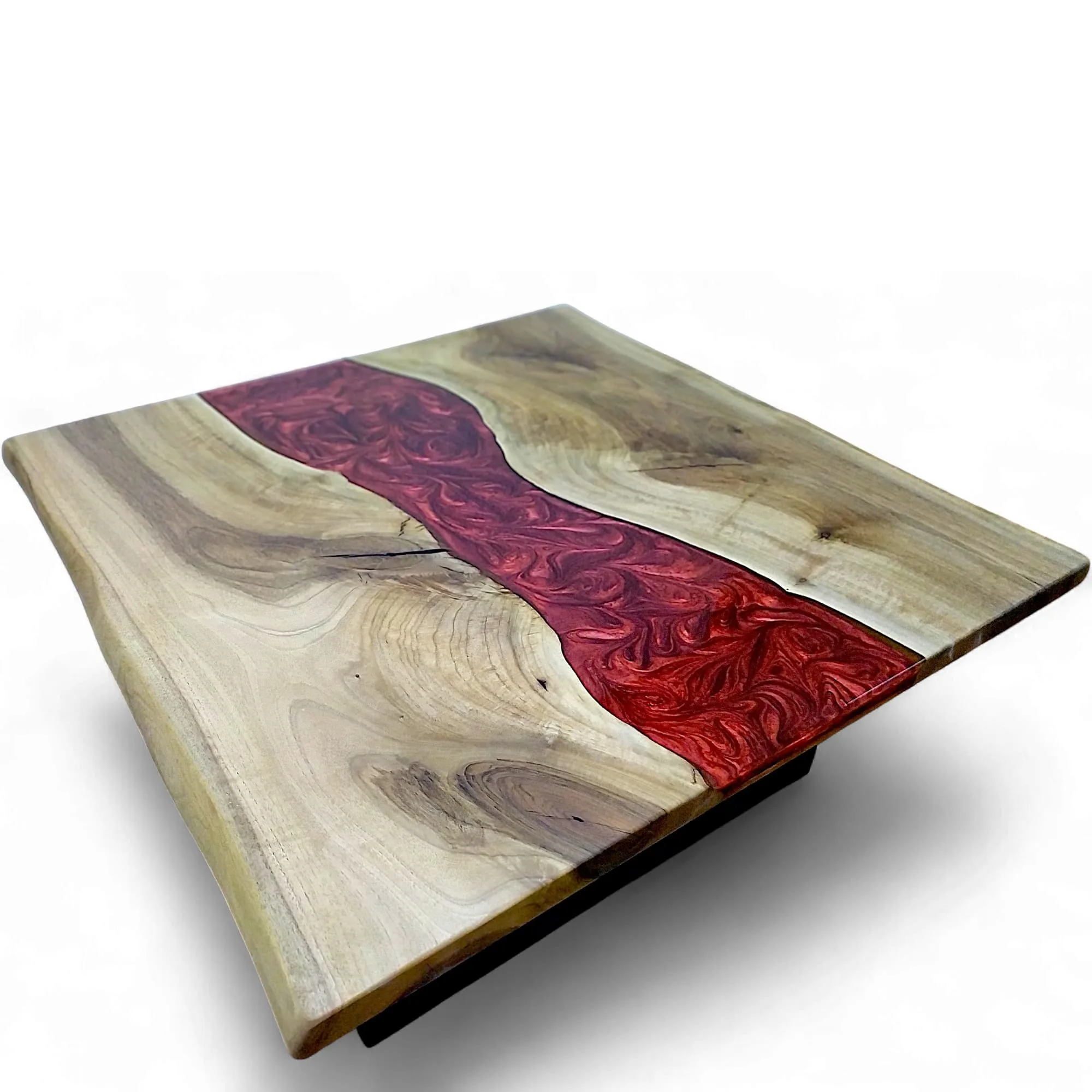 closeup of pearled red epoxy river and walnut grain