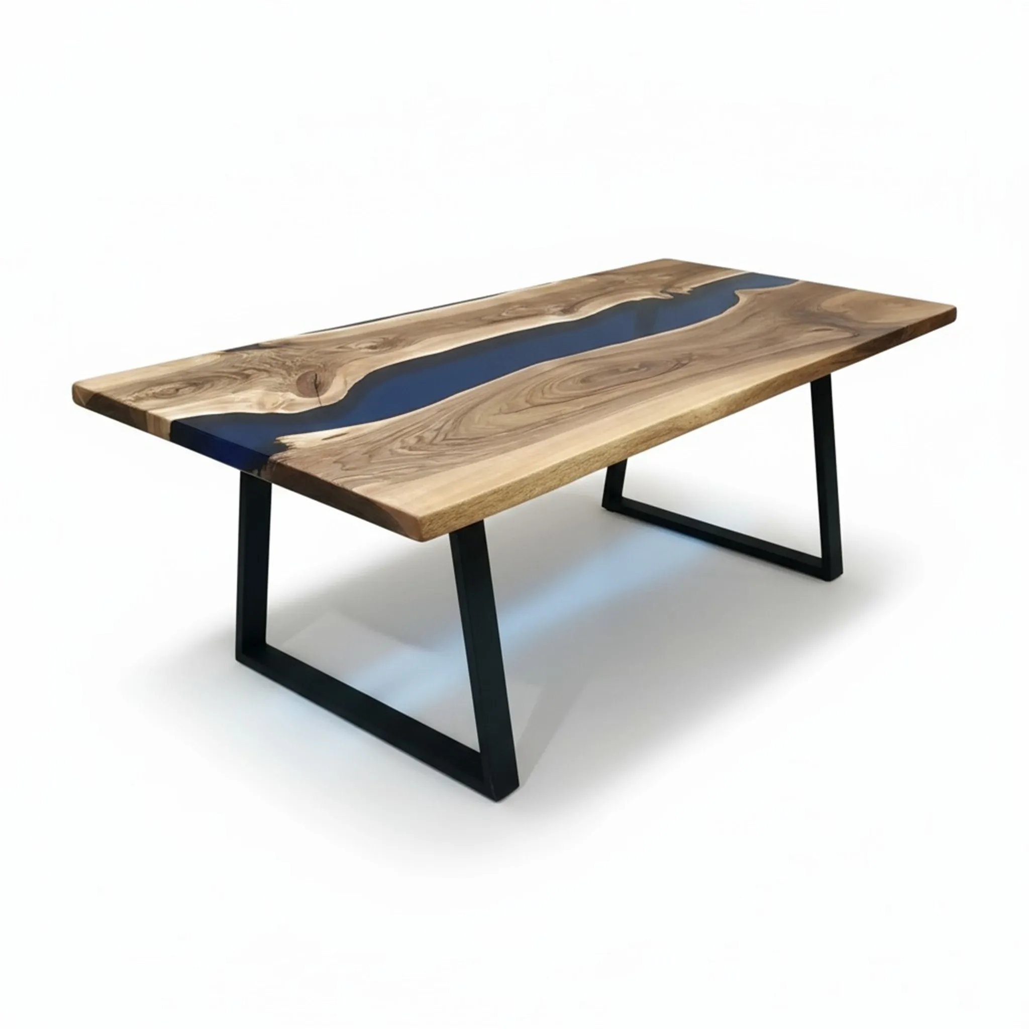 Close-up of transparent blue epoxy river in walnut dining table