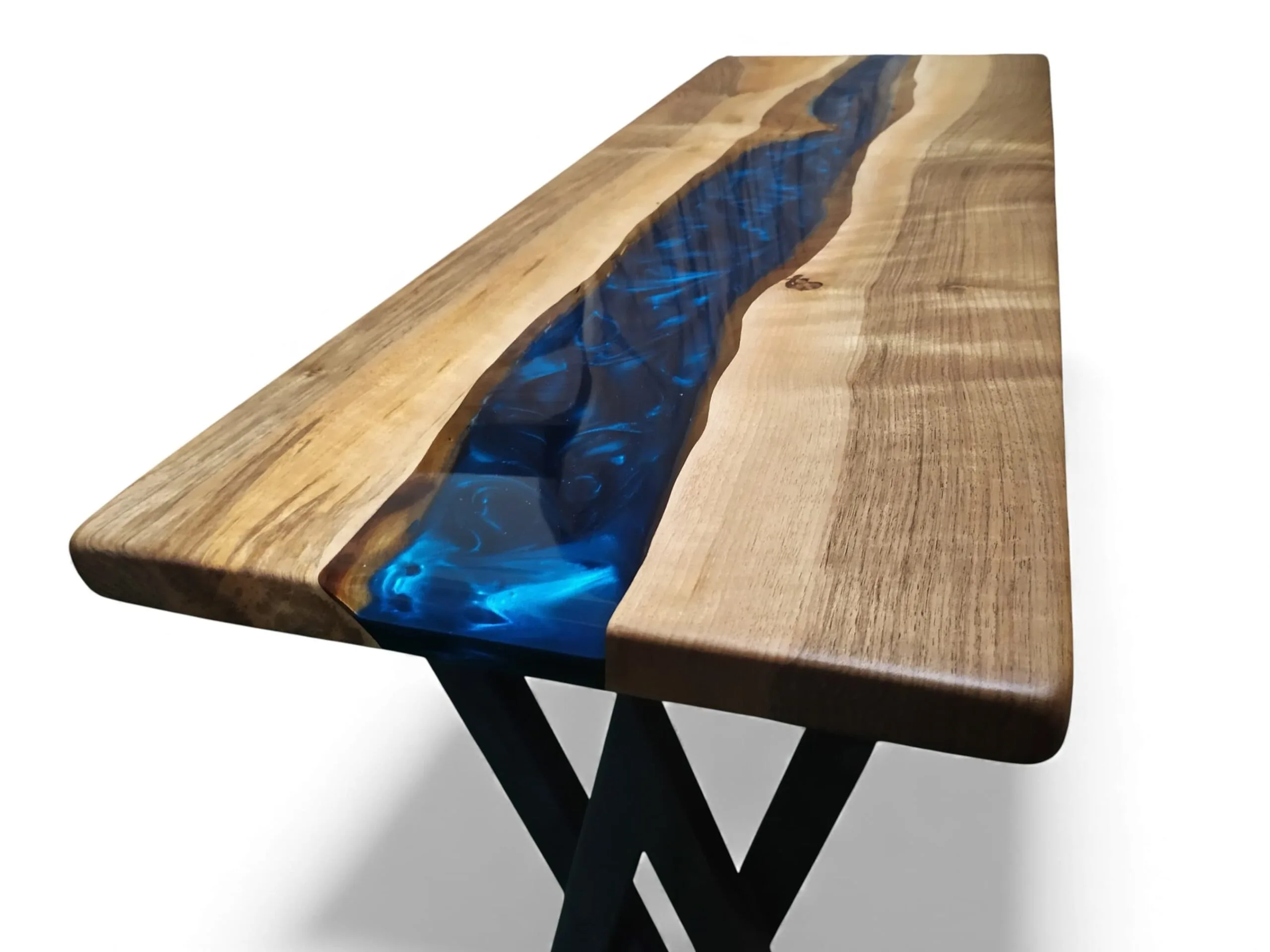 Close-up of walnut grain and navy epoxy