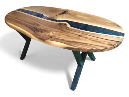 Angled view of walnut oval epoxy dining table