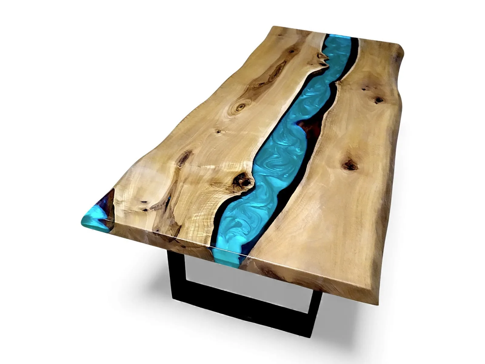Live edge wood table with a striking river of turquoise blue epoxy resin.