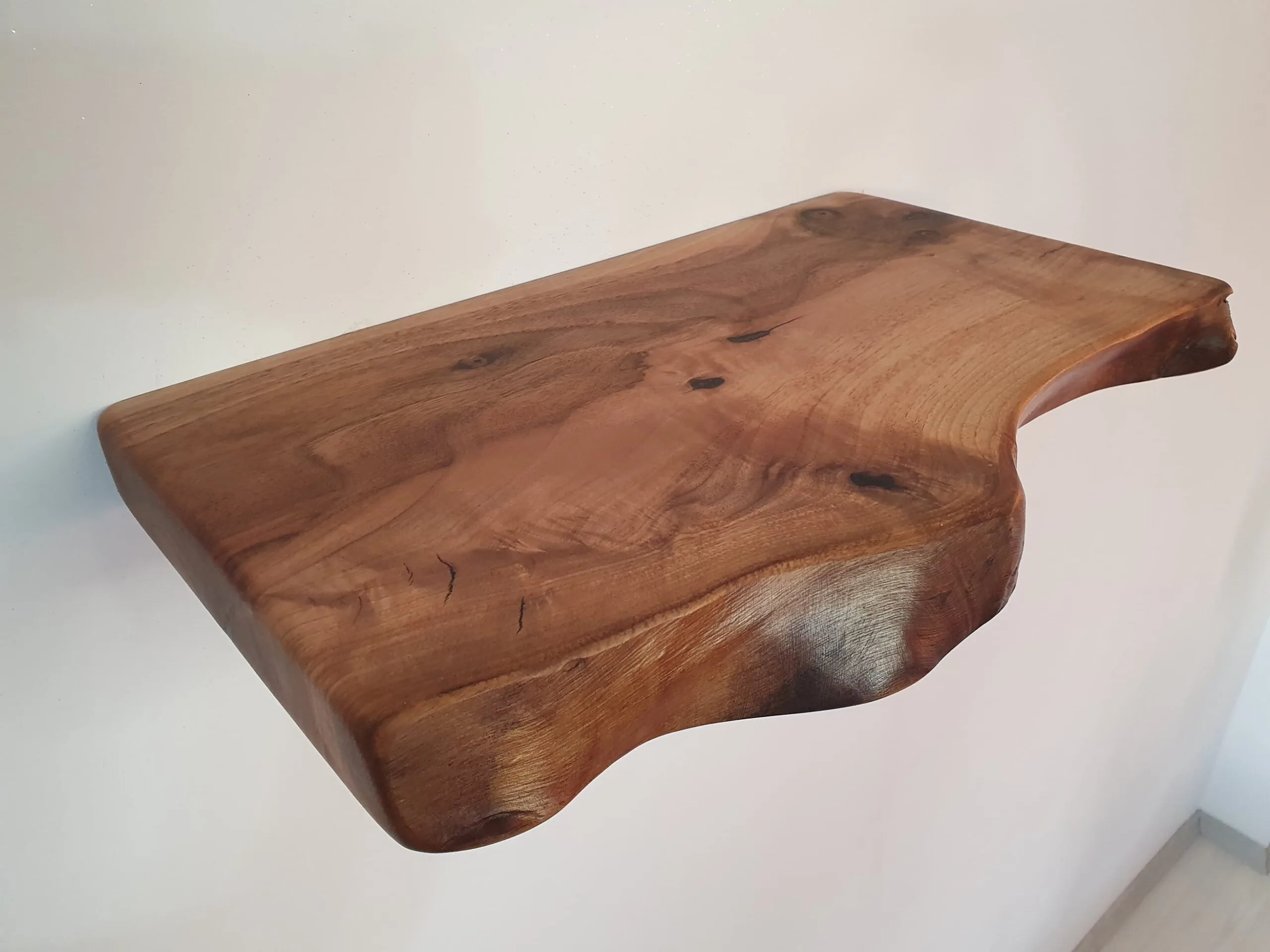 Live edge walnut wood shelf with natural grain