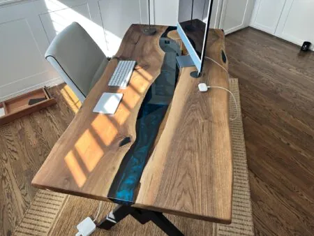 Luxury walnut epoxy desk in modern office