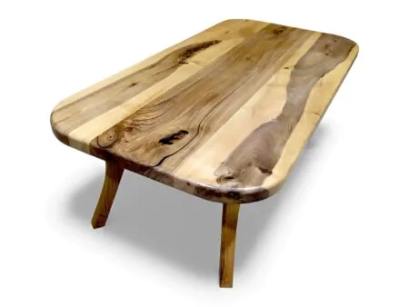 Natural wood grain on rounded corner walnut coffee table