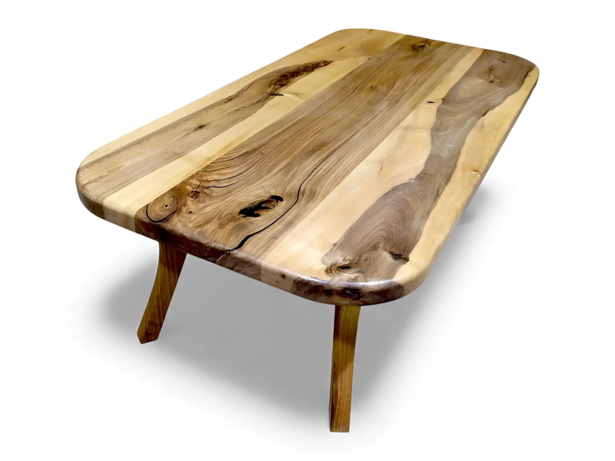 Natural wood grain on rounded corner walnut coffee table