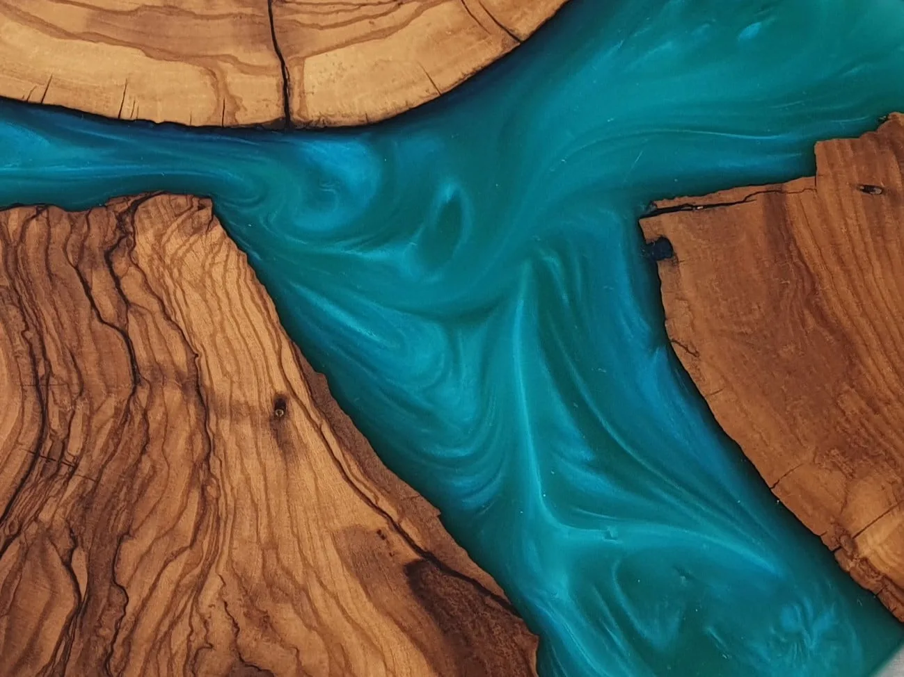 Olive wood epoxy cutting board detail