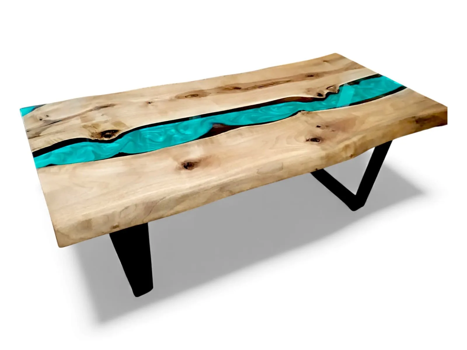 A collection of handmade resin art furniture pieces featuring turquoise accents.