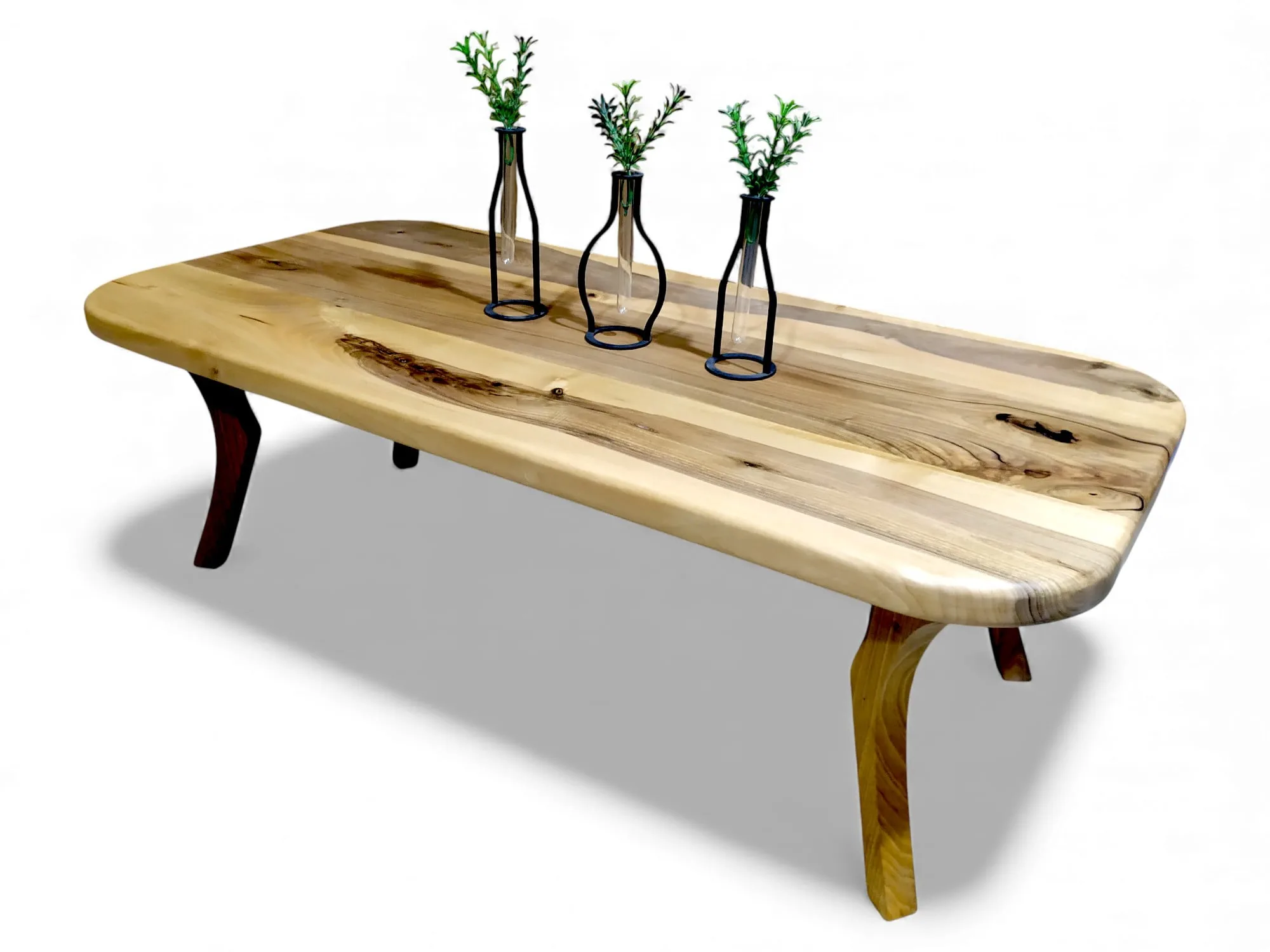 Walnut coffee table with rounded corners, solid walnut legs and rounded corners