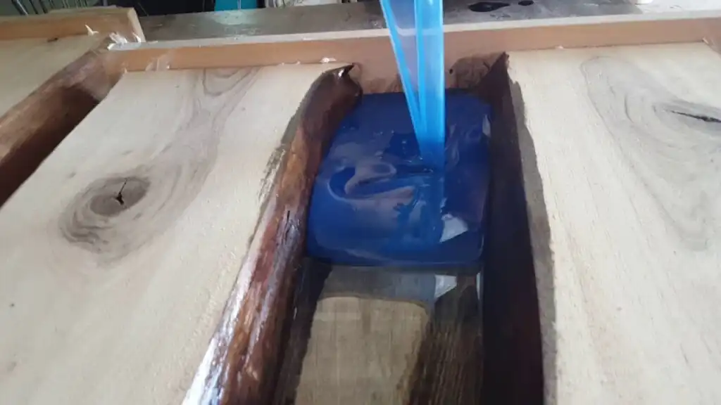 WOWbyALP epoxy resin pouring process on walnut table, what is epoxy furniture example made with walnut and resin
