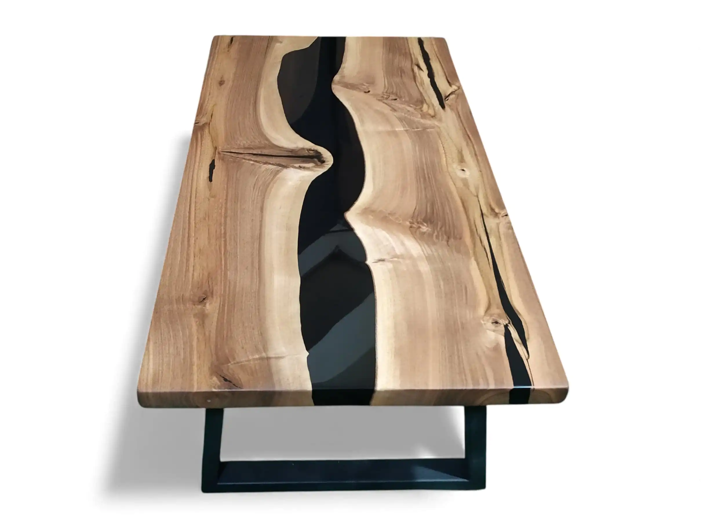 epoxy resin coffee table polished high gloss resin surface reflecting natural walnut grain
