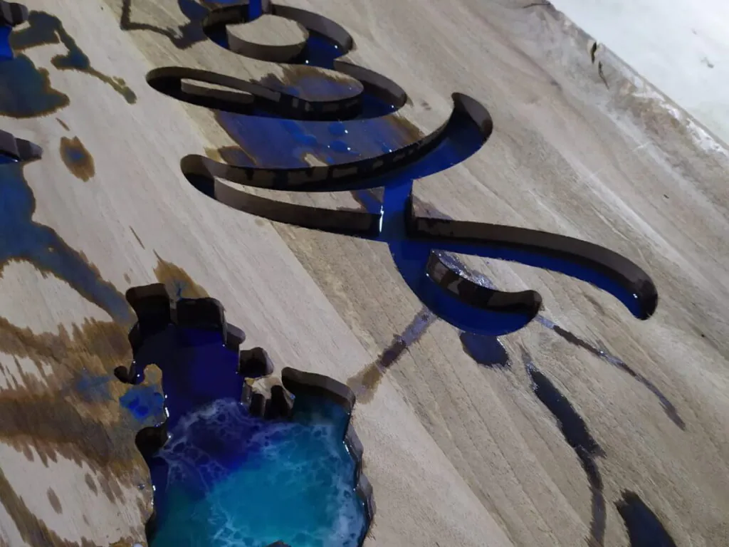 solid wood entryway bench with artistic blue epoxy resin design