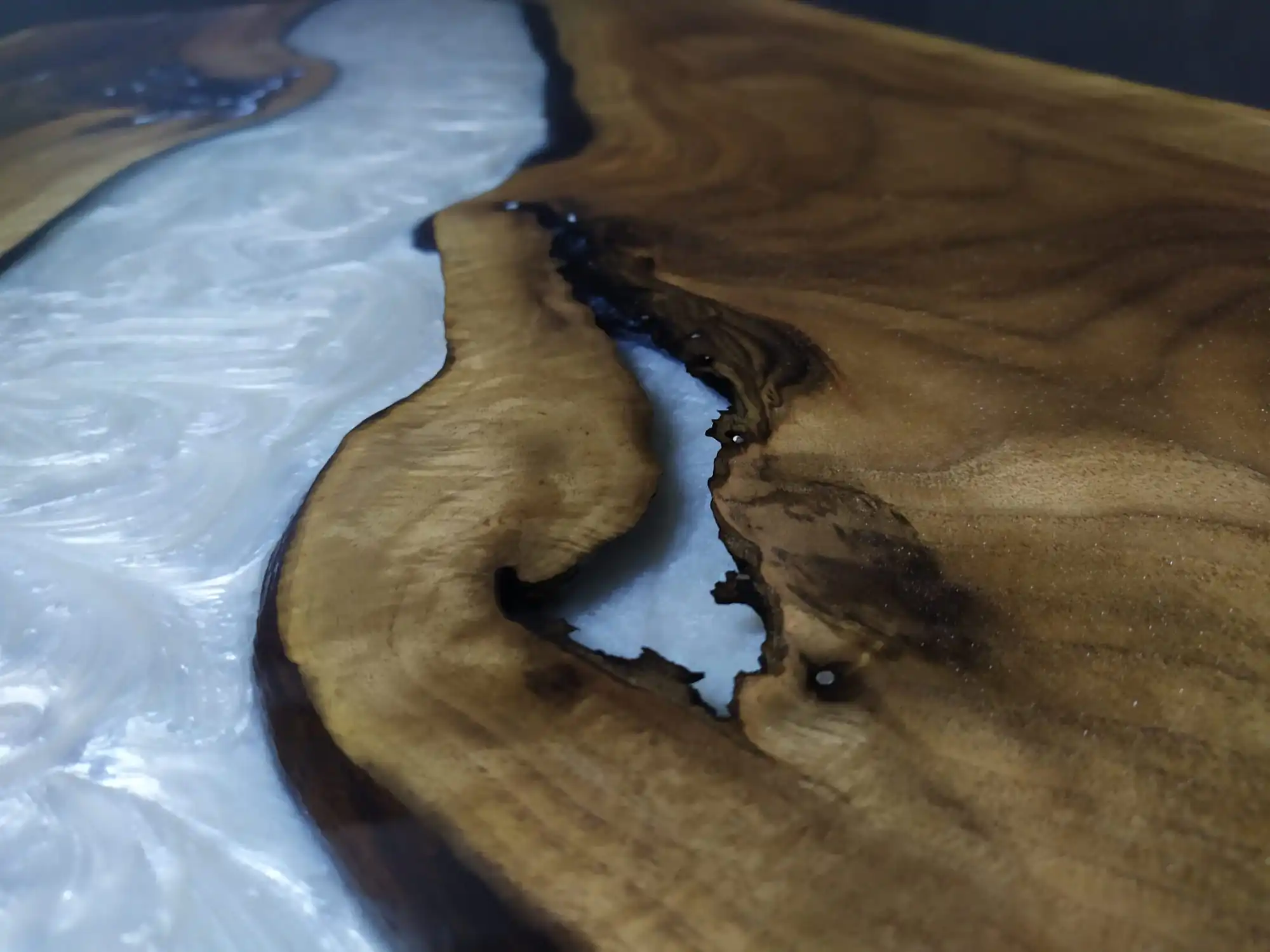 Close up epoxy table surface - does epoxy furniture increase home value
