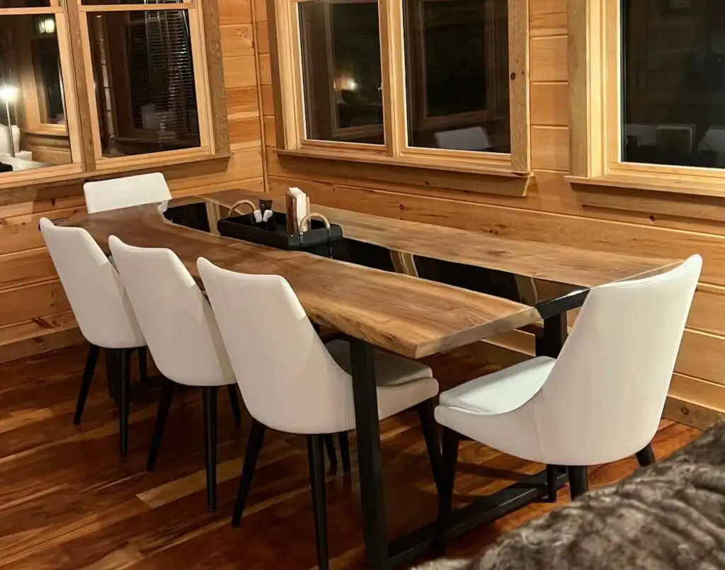 Epoxy dining table picture with black epoxy in a client's dining room