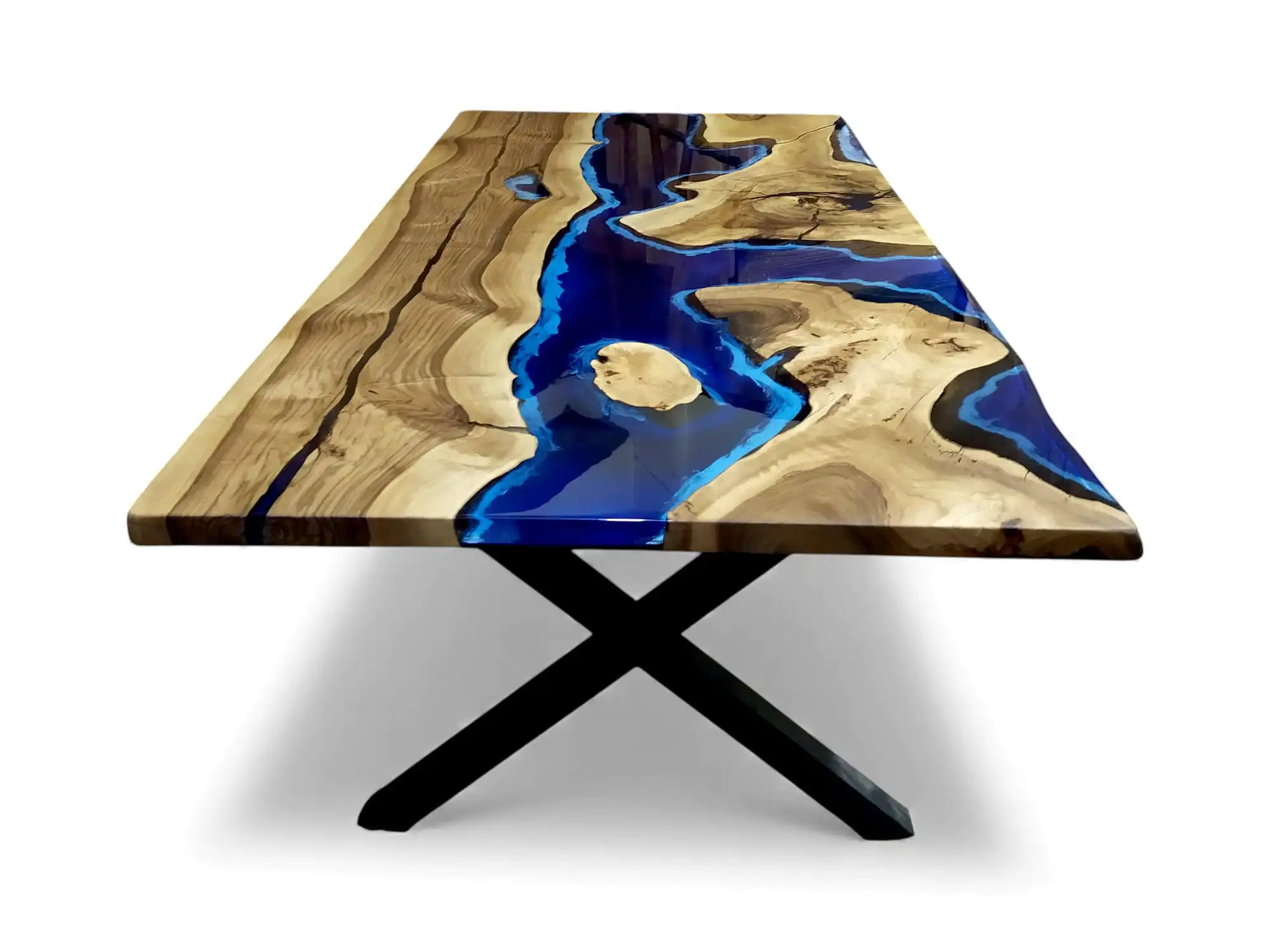 angle shot of the handcrafted blue and white epoxy dining table with a metal base on a white background.