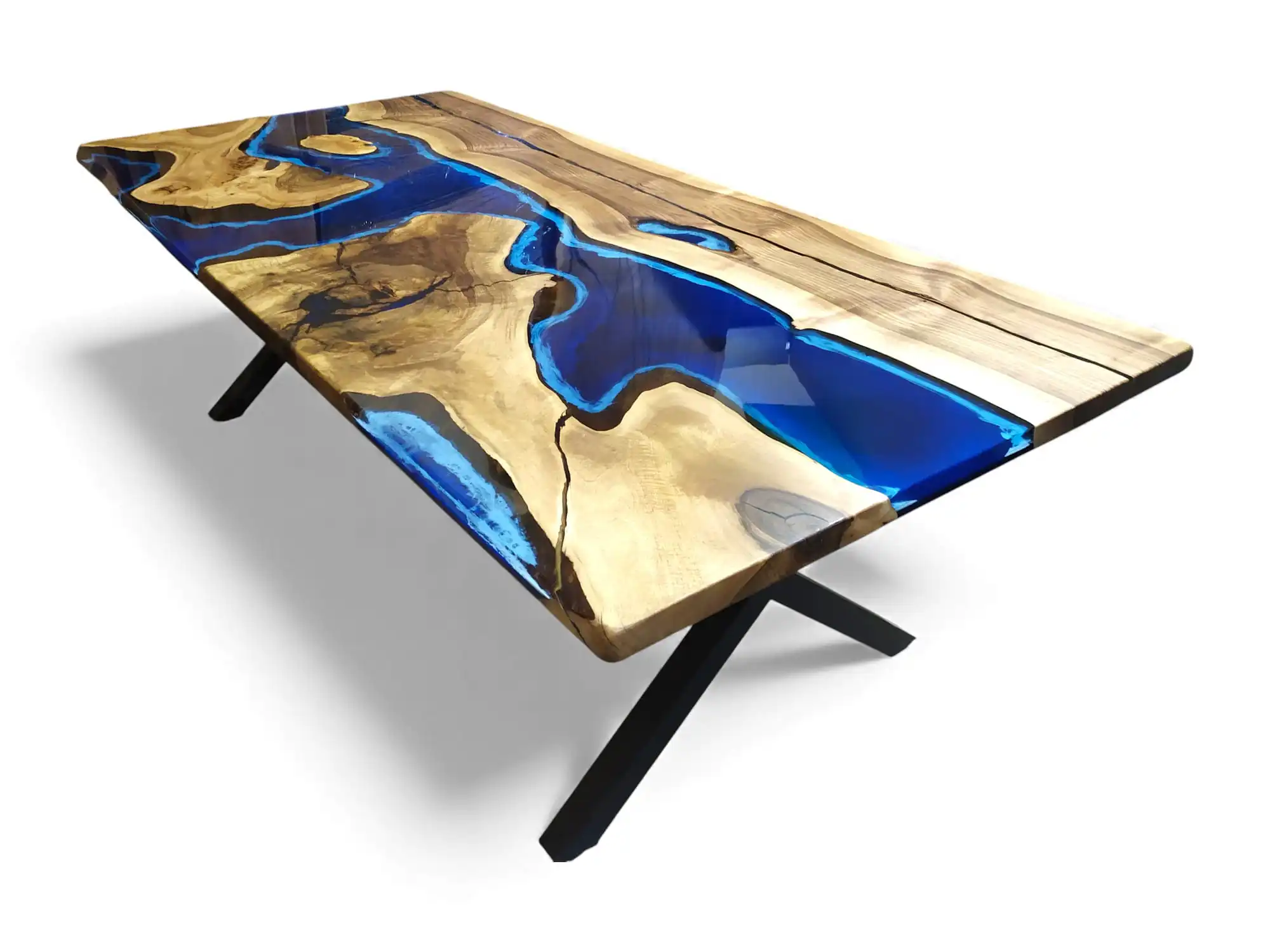 Corner detail shot of the blue and white epoxy walnut dining table on a clean white background.