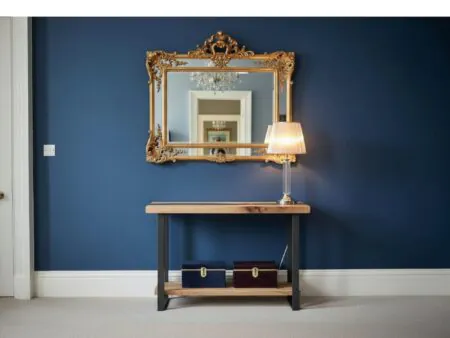 An elite luxury foyer showcase highlighting our signature Epoxy Console Table with Shelf crafted from dark walnut.