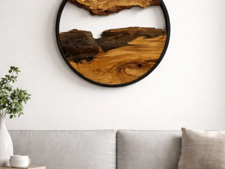 Premium round wood wall art featuring live edge olive wood in a sleek metal frame.
