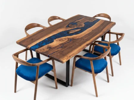Bespoke epoxy dining table with chairs showcasing deep navy blue river and tailored Heritage seating.