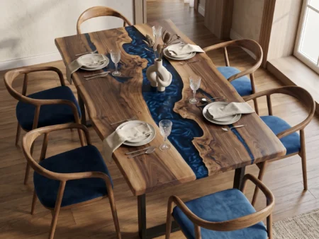 Modern luxury dining room interior featuring a handcrafted navy blue epoxy dining table with chairs and warm ambient lighting.